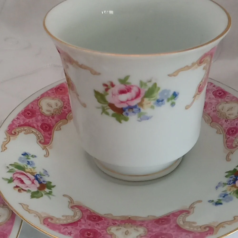 Two Beautiful Dainty Cups And Saucers